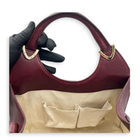 Stirrup Top Handle Bag Red in Calfskin, Gold hardware