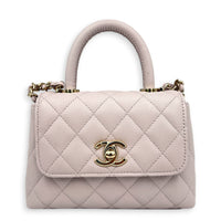 Coco Handle Quilted Super Mini Lilac Top Handle Bag in Caviar Leather, Gold hardware