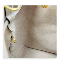 NeoNoe MM Beige Bucket Bag in Monogram Empreinte Leather, Gold hardware