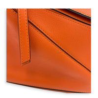 Puzzle Top Handle Bag Small Orange in Calfskin, Silver hardware