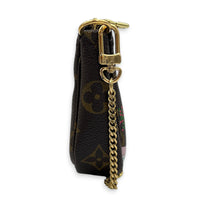Mini Pochette Accessoires Pouch Fuchsia in Monogram Coated Canvas, Gold hardware