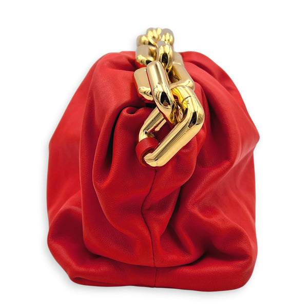 The Chain Pouch Orange Shoulder Bag in Calfskin, Gold hardware