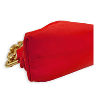 The Chain Pouch Orange Shoulder Bag in Calfskin, Gold hardware