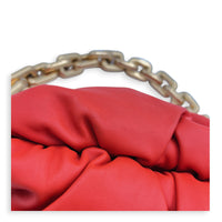 The Chain Pouch Orange Shoulder Bag in Calfskin, Gold hardware