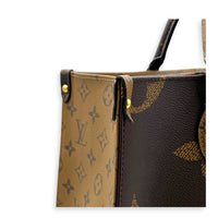OnTheGo Top Handle Bag MM Brown in Coated Canvas, Gold hardware