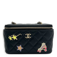 Quilted Roller Skate Charm Black Vanity Bag in Lambskin, Gold hardware