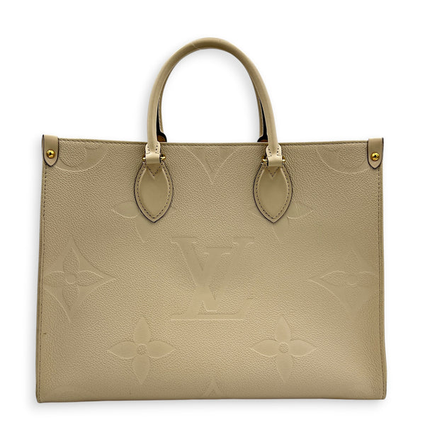 OnTheGo Tote Bag MM White in Empreinte Leather, Gold hardware