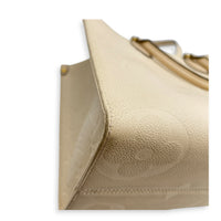 OnTheGo Tote Bag MM White in Empreinte Leather, Gold hardware