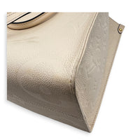 OnTheGo Tote Bag MM White in Empreinte Leather, Gold hardware