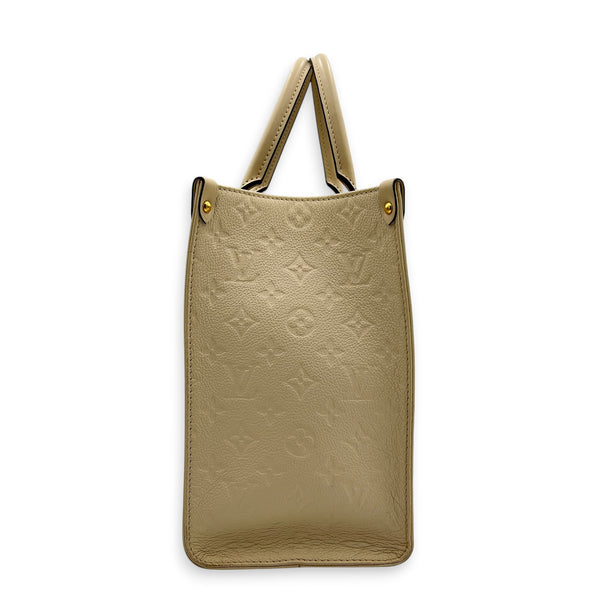 OnTheGo Tote Bag MM White in Empreinte Leather, Gold hardware