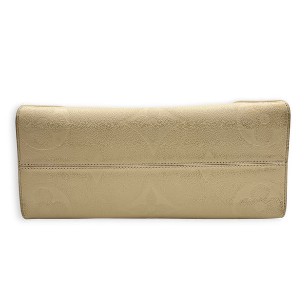 OnTheGo Tote Bag MM White in Empreinte Leather, Gold hardware