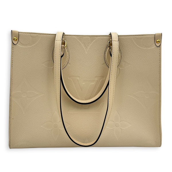 OnTheGo Tote Bag MM White in Empreinte Leather, Gold hardware