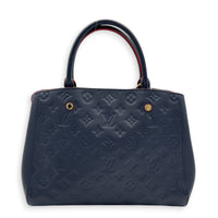 Montaigne MM Blue Shoulder Bag in Monogram Empreinte Leather, Gold hardware