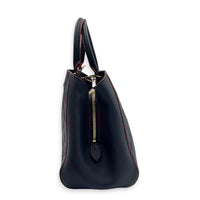 Montaigne MM Blue Shoulder Bag in Monogram Empreinte Leather, Gold hardware