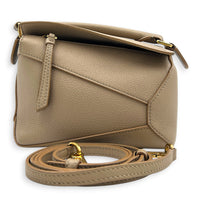 Puzzle Mini Sand Top Handle Bag in Calfskin, Gold hardware