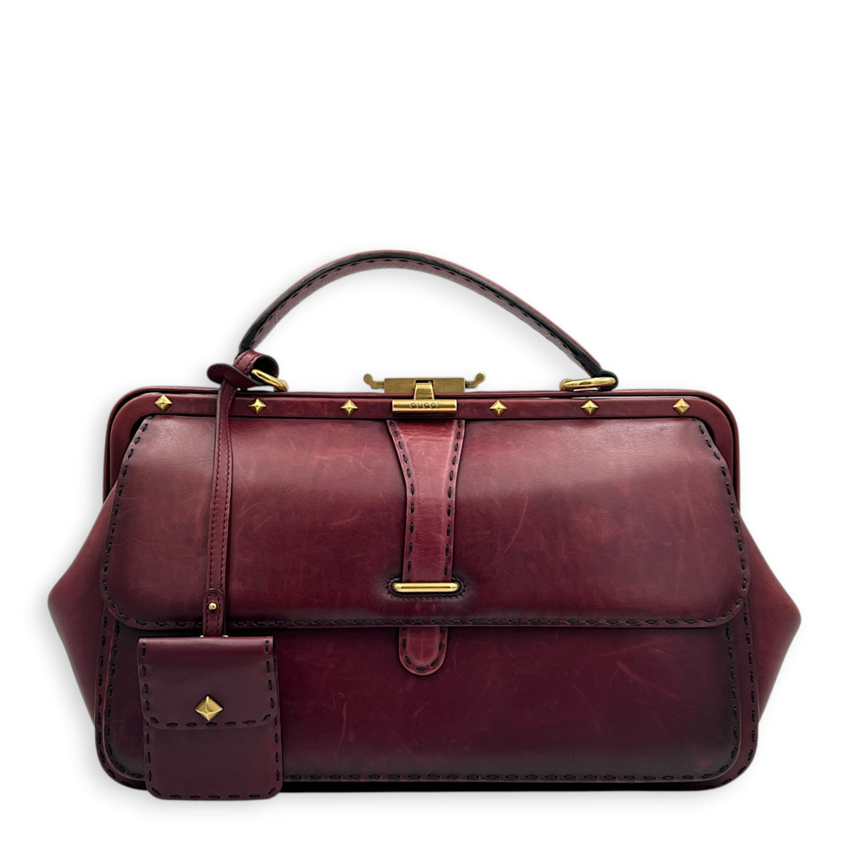 Lady Stirrup Red Top Handle Bag in Calfskin, Gold hardware