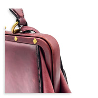 Lady Stirrup Red Top Handle Bag in Calfskin, Gold hardware