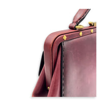 Lady Stirrup Red Top Handle Bag in Calfskin, Gold hardware
