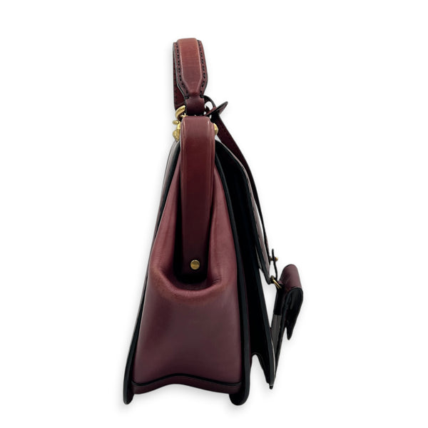 Lady Stirrup Red Top Handle Bag in Calfskin, Gold hardware