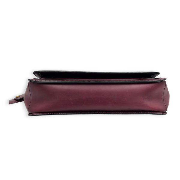 Lady Stirrup Red Top Handle Bag in Calfskin, Gold hardware