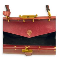Lady Stirrup Red Top Handle Bag in Calfskin, Gold hardware