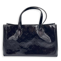 Wilshire Amarante Top Handle Bag in Monogram Vernis Leather, Gold hardware