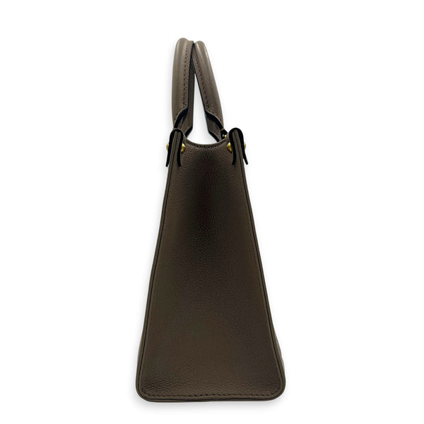 OnTheGo PM Beige Tote Bag in Monogram Empreinte Leather, Gold hardware