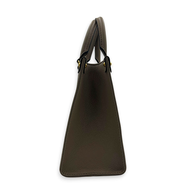 OnTheGo PM Beige Tote Bag in Monogram Empreinte Leather, Gold hardware