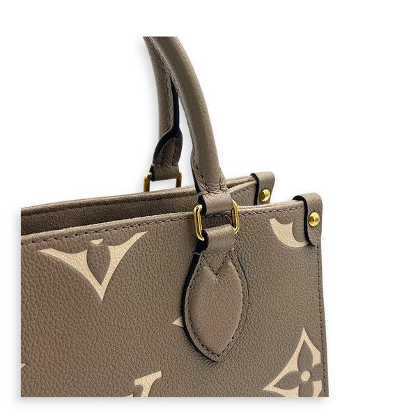 OnTheGo PM Beige Tote Bag in Monogram Empreinte Leather, Gold hardware