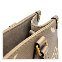 OnTheGo PM Beige Tote Bag in Monogram Empreinte Leather, Gold hardware