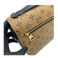 Metis Brown Crossbody Bag in Monogram Coated Canvas, Gold hardware