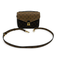 Metis Brown Crossbody Bag in Monogram Coated Canvas, Gold hardware