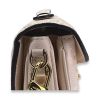 Metis East West Beige Crossbody Bag in Monogram Empreinte Leather, Gold hardware
