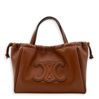 Triomphe Drawstring Top Handle Bag Brown in Calfskin, Gold hardware