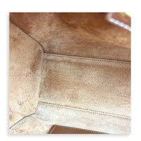 Triomphe Drawstring Top Handle Bag Brown in Calfskin, Gold hardware