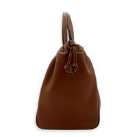 Triomphe Drawstring Top Handle Bag Brown in Calfskin, Gold hardware