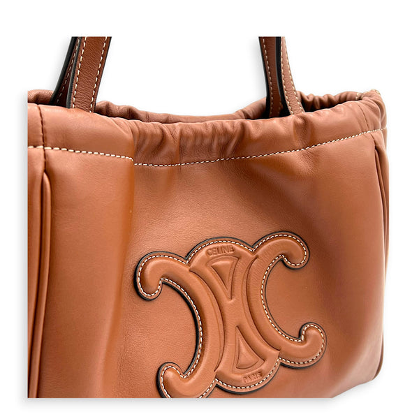 Triomphe Drawstring Top Handle Bag Brown in Calfskin, Gold hardware