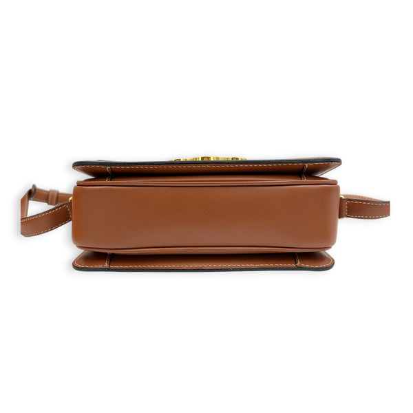 Triomphe Teen Brown Crossbody Bag in Coated Canvas, Gold hardware