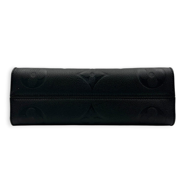OnTheGo East West Black Top Handle Bag in Empreinte Leather, Gold hardware