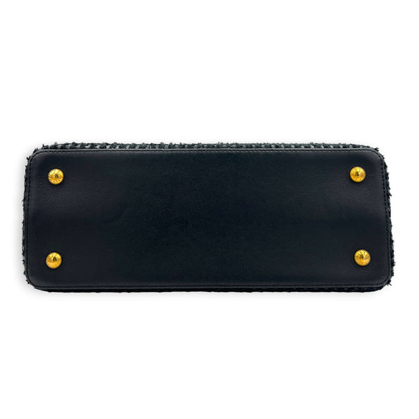 Capucines Top Handle Bag MM Black in Tweed, Gold hardware