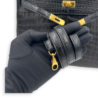 Kelly 35 Black Top Handle Bag in Matte Niloticus, Gold hardware