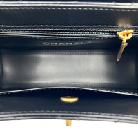 Kelly Mini Black Top Handle Bag in Calfskin, Gold hardware