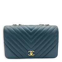 Chevron Statement Flap Shoulder Bag Metallic Blue in Caviar Leather, Gold hardware