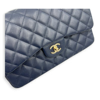 Classic Double Flap Shoulder Bag Jumbo Blue in Caviar Leather, Light Gold hardware