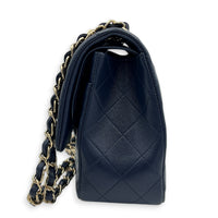 Classic Double Flap Shoulder Bag Jumbo Blue in Caviar Leather, Light Gold hardware