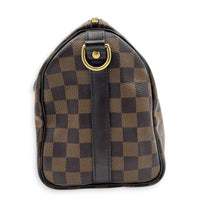 Speedy Bandouliere Top Handle Bag 25 Brown in Coated Canvas, Gold hardware