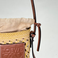 Cylinder Pouch Brown Crossbody Bag in Raffia